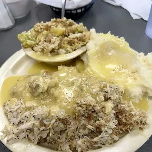 Chicken casserole, broccoli casserole and mashed potatoes