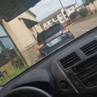 a car driving down the street