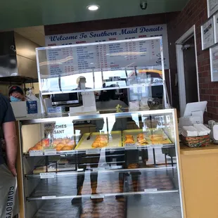 a man standing in front of the counter