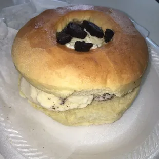 New baked donut and icecream sandwich is something every foodie should get!