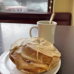 Cinnamon roll and a cup o' joe