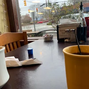 a cup of coffee on a table