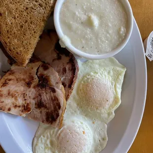 Eggs, City Ham, Whole Wheat Toast and the best grits ever!