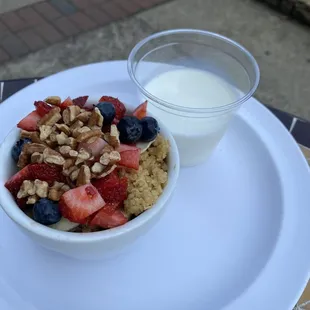 Oatmeal with fruit and pecans.