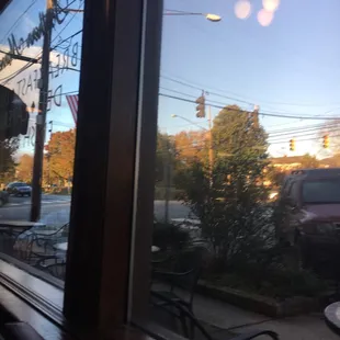 a view of a street through a window