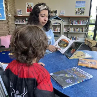 Volunteer reading to children