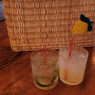 two glasses of lemonade and a basket of lemonade