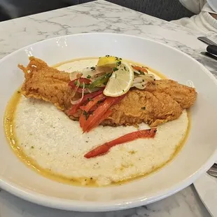 Protein and grits with fried catfish