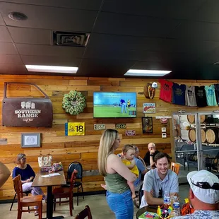 a group of people sitting around a table