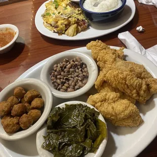 Fried Catfish with collard greens black eyed peas and fried okra