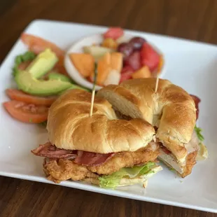 a chicken sandwich and a salad
