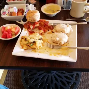 Cajun omlete with smothered pot, biscuit and gravy with fruit.  Coffer and water.   This was delicious !!!