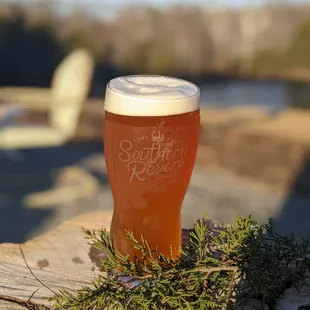 a pint of beer on a table