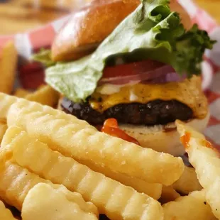 Single cheeseburger with a mountain of fries, $10