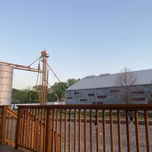 Silos &amp; feed store off the patio.