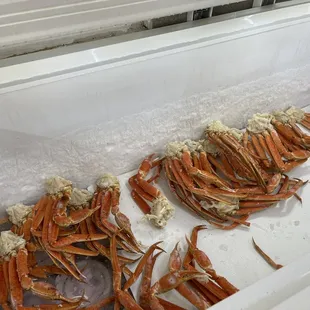 a display of crab legs on ice