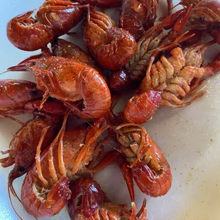 a plate of cooked crawfish