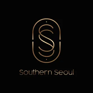 a black background with a gold logo