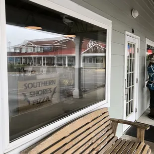 a bench outside a restaurant