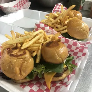 Two sliders and fries to go! Come and get your order we&apos;re waiting for you.