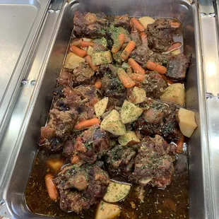 beef, potatoes, carrots, and gravy