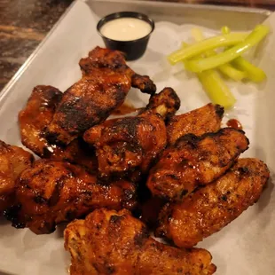 a plate of chicken wings