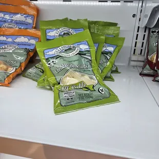 a variety of snacks on a shelf