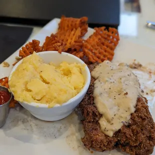Chicken-fried Steak with sweet potato fries and cheddar grits