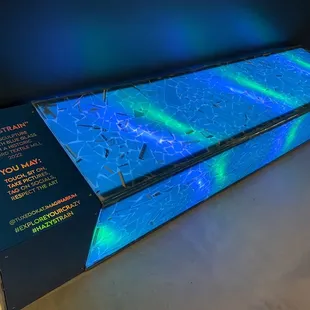 a blue and green box with information on it