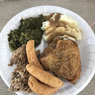 BBQ, collard greens, mashed potatoes with gravy, fried chicken, and hush puppies! Gotta love the South!