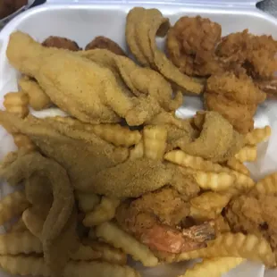 #5 fried catfish, shrimp fries and 2 hush puppies