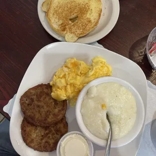 Scrambled eggs with cheese, creamy grits, and well made grits!