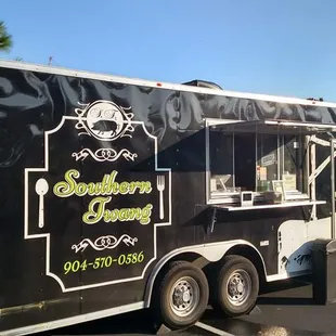 a food truck parked in a parking lot