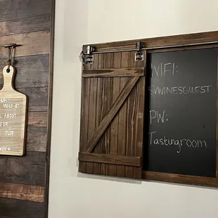 a chalkboard and a wooden door