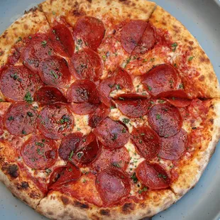 Sweet &amp; Spicy Pepperoni Pizza made in our wood-fired oven