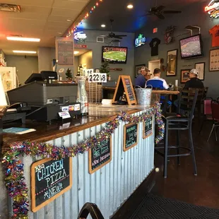 Checking our friend's pizza place. I just know it'll be great. Very busy and clean and airy and bright atmosphere.