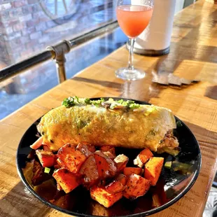 Veggie omelet with ham and country sweet potatoes.