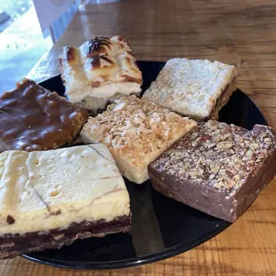 Chocolate walnut fudge, coconut fudge, cheesecake brownie, 7 wonder bar, caramelitas, rocky road bar