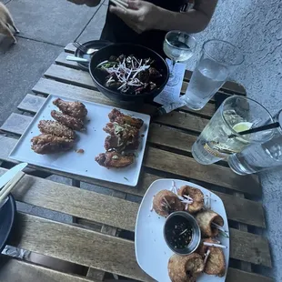 Veggie Dumplings, Soy and Spicy wings, Crispy Brussels