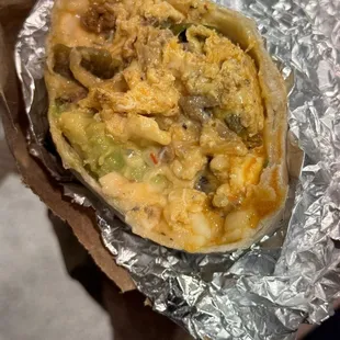 Southie breakfast burrito - amazing! Delicious with a spicy kick! They make it fresh so give them like 10 mins so that you can get this!