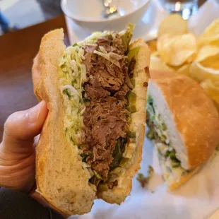Spicy Hog sandwich. $16. Pulled pork, Southie slaw, pickled jalapeno, lime aioli, Acme bun.
