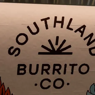 a sign for a burrito company