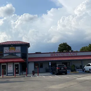 a restaurant with a red roof