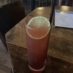 a drink with a slice of lime on the rim