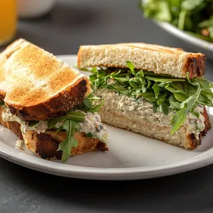 a chicken salad sandwich on a plate