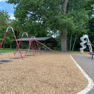 Pavillion behind swings