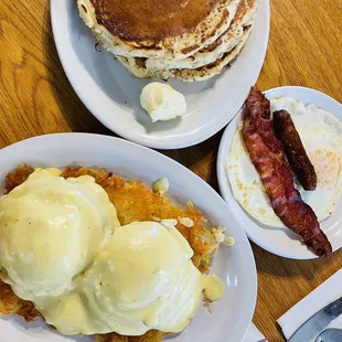 pancakes, eggs, bacon and hash browns