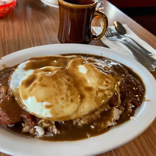 Corned beef hash Benedict ($16.50) w/ eggs over easy, endless coffee - 11/10!
