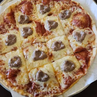 Pepperoni, sausage and extra cheese pizza
