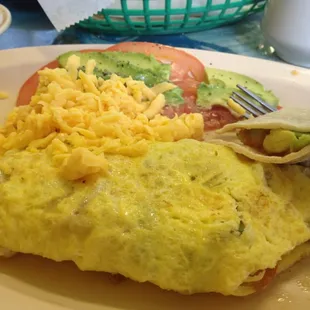 They forgot to put cheese on omelette so they brought it later! It's all good